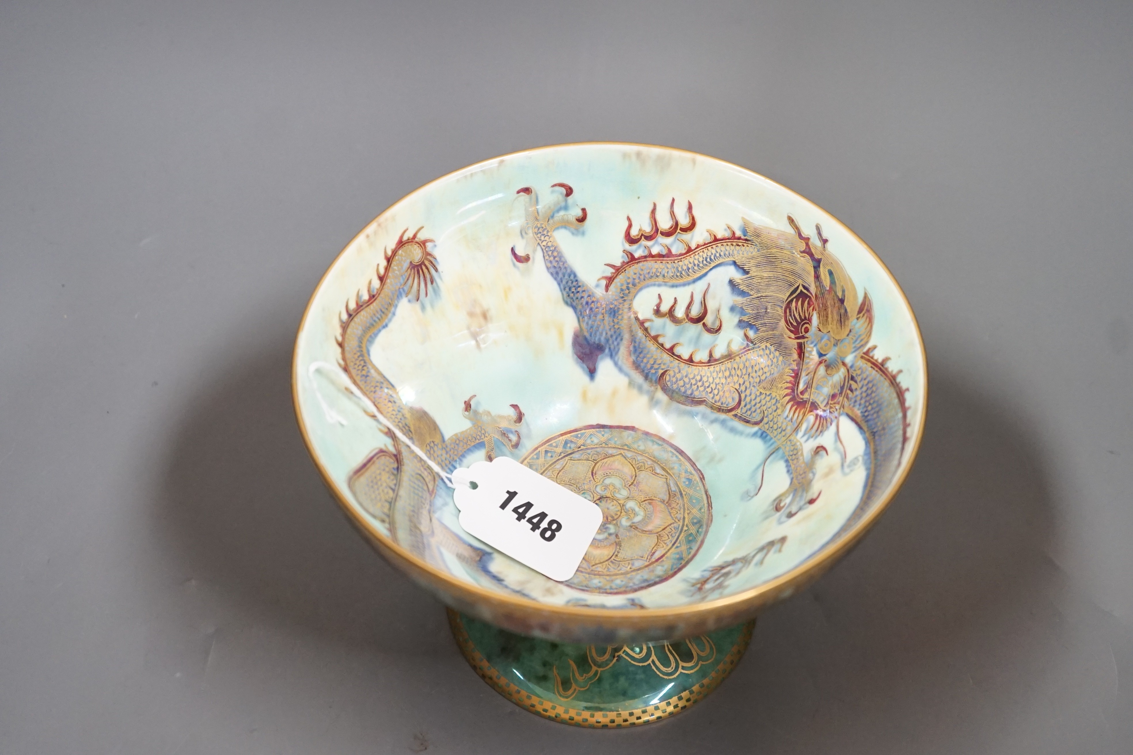 A Wedgwood dragon lustre pedestal bowl, designed by Daisy Makeig-Jones, pattern z4831, 14cms high